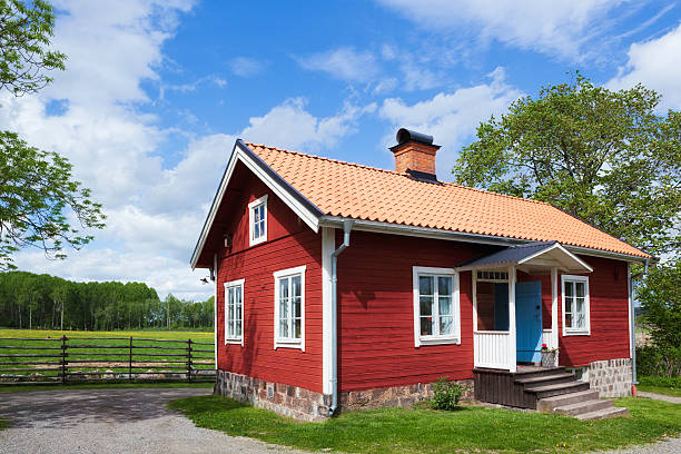 Red Cottage On The Swedish Countryside.